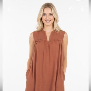 Flawless rust color slip on boho dress with pockets size small